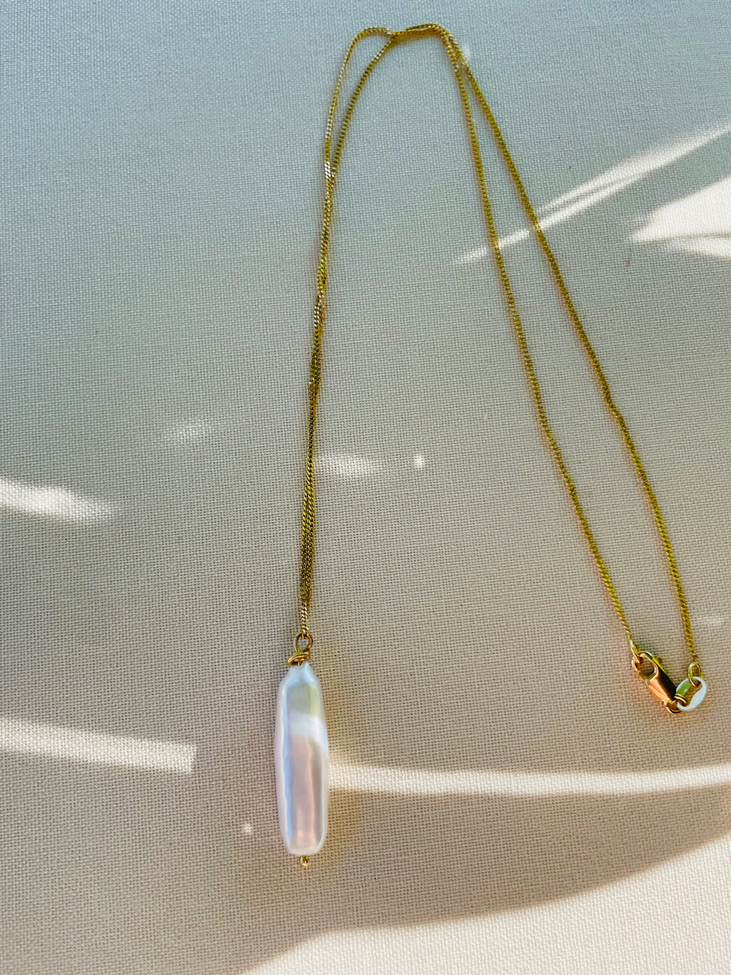 Coastal Collection + Solitaire Japanese Biwa Pearl pendant + vermeil chain